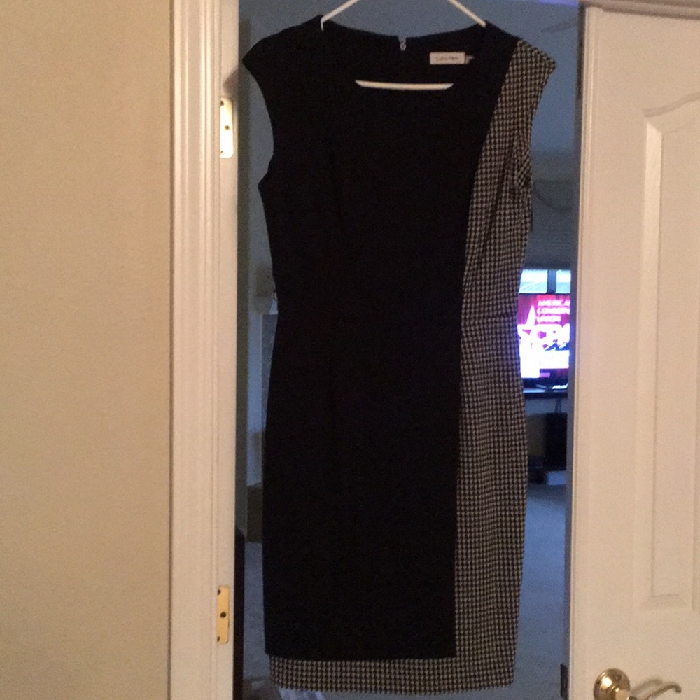 Calvin Klein size 6 dress, never worn.